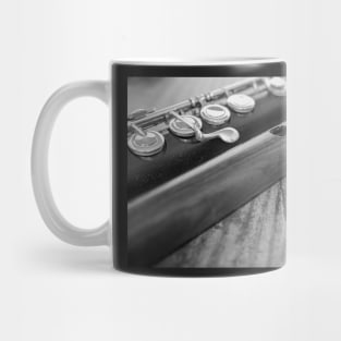 Close up of a traditional wooden flute on a table Mug